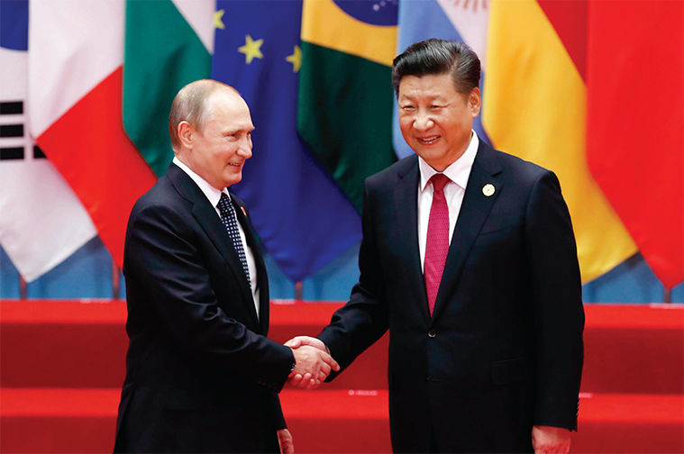 중국과 러시아도 자국 우선주의를 강화하는 것으로 보인다. 주요 20개국(G20) 정상회의에서 악수를 나누는 시진핑 중국 국가주석과 푸틴 러시아 대통령.